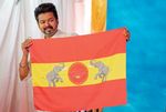 Vijay with the flag of his party Tamilaga Vettri Kazhagam