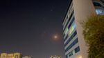 Missiles and air-defense interceptors illuminate the night sky over Doha after Iran launched an attack on US forces at Al Udeid Air Base on June 23, 2025 in Doha
