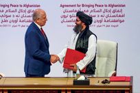 Zalmay Khalilzad, former US envoy to Afghanistan, and Mullah Abdul Ghani Baradar, leader of the Taliban delegation, Doha,