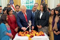 Donald Trump lights a diya on Deepavali in the Oval Office, October 24, 2019