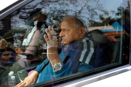 Samajwadi Party leader Mulayam Singh Yadav leaves his residence after addressing his supporters on January 16, 2017 in Lucknow