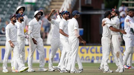 Virat Kohli (R) hugs his teammate Mohammed Shami after winning the fourth day of the third Test match between South Africa and India at Wanderers cricket ground in Johannesburg on January 27, 2018