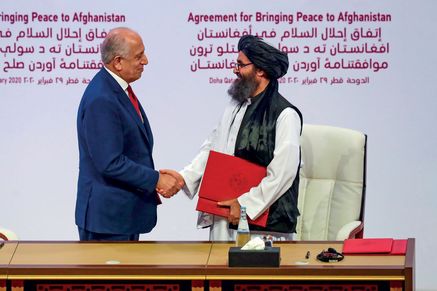 Zalmay Khalilzad, former US envoy to Afghanistan, and Mullah Abdul Ghani Baradar, leader of the Taliban delegation, Doha,