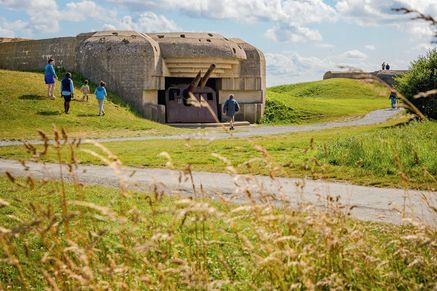 A German artillery gun at Longues-sur-Mer, part of the infamous Atlantic Wall, where such batteries hammered targets up to 20 miles away with 150mm shells