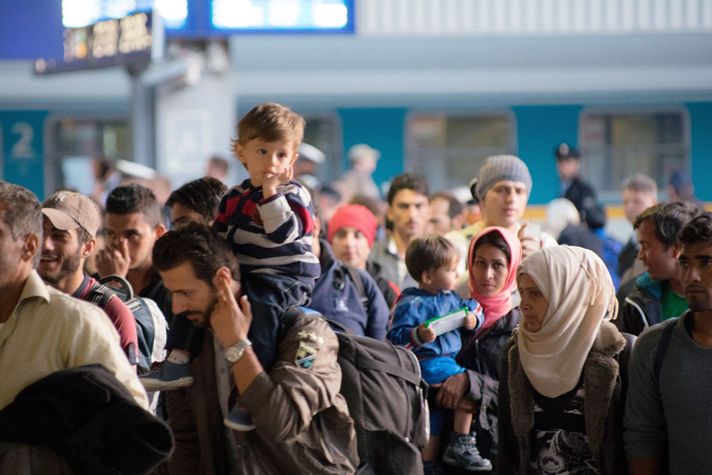 HOMELESS AND HOME: Thousands of Syrian refugees arrive in Munich after having crossed south-eastern Europe on foot (Photo: GEOVIEN SO/GETTY IMAGES)