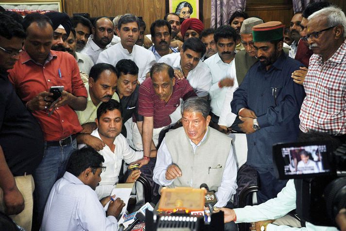 IN LIMBO: Former Uttarakhand Chief Minister Harish Rawat addresses a press conference on 29 March in Dehradun