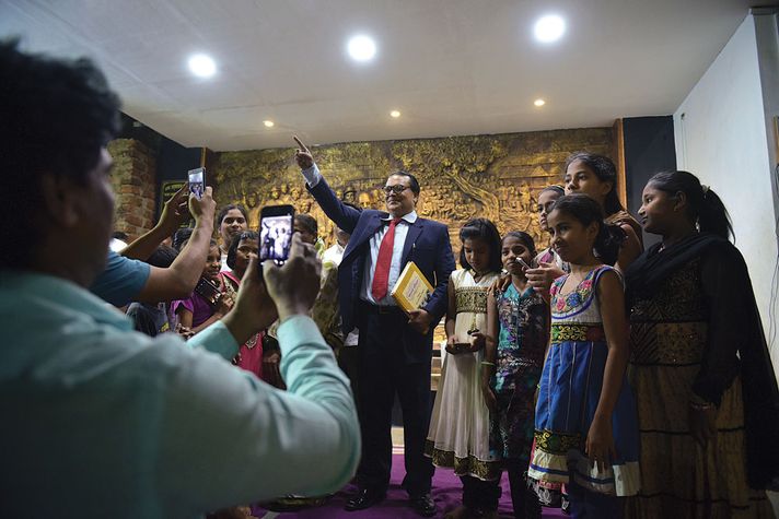 GULABRAO OVHAL  with residents of Bhosri village, Maharashtra (Photo: RITESH UTTAMCHANDANI)