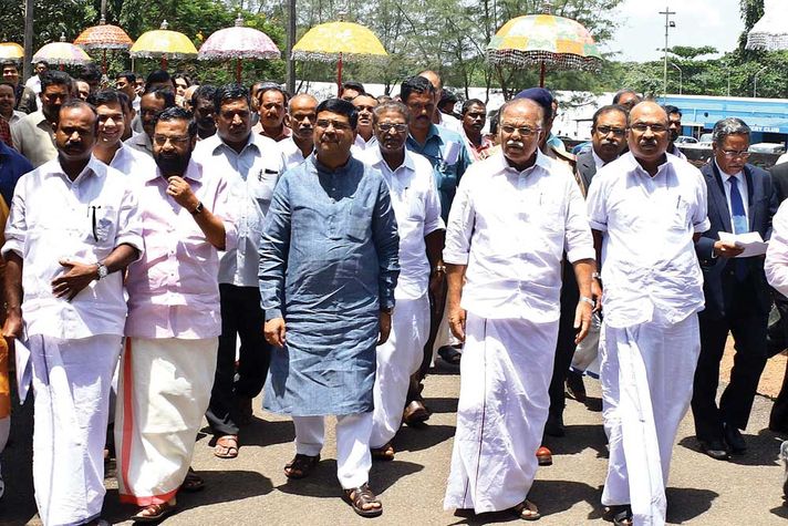 Minister Of State for Petroleum and Natural Gas Dharmendra Pradhan and other dignitaries are being received during their arrival for the inauguration of the Golden Jubilee Celebration