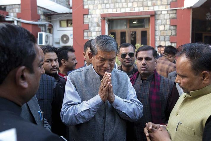 Harish Rawat outside his residence in Dehradun