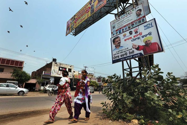 Campaign posters on the Ropar-Chandigarh highway