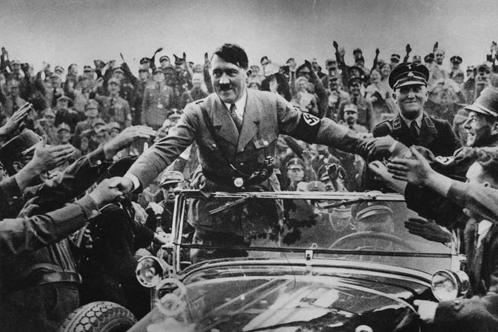 Adolf Hitler (1889 - 1945), chancellor of Germany, is welcomed by supporters at Nuremberg