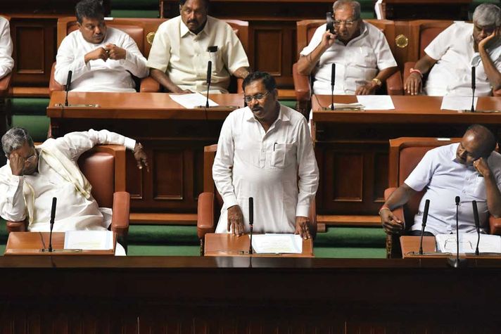 (L-R) Siddaramaiah, G Parameshwara and HD Kumaraswamy at an Assembly session in Bengaluru