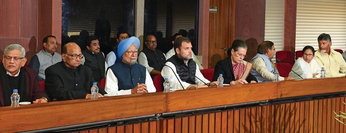 (L-R) Sitaram Yechury, Sharad Pawar, Manmohan Singh, Rahul Gandhi, Sonia Gandhi, Sharad Yadav, Mamata Banerjee and N Chandrababu Naidu at a meeting on February 27, New Delhi