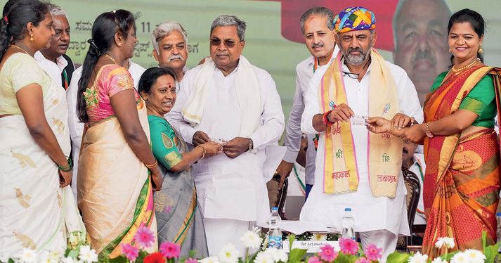 Karnataka Chief Minister Siddaramaiah and Deputy Chief Minister DK Shivakumar at the launch of the Shakti Yojana, a scheme offering free bus travel to women, Bengaluru, June 11, 2023