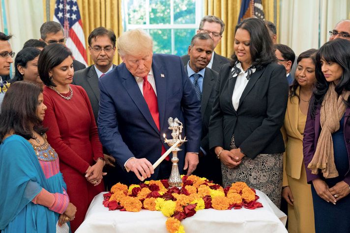 Donald Trump lights a diya on Deepavali in the Oval Office, October 24, 2019