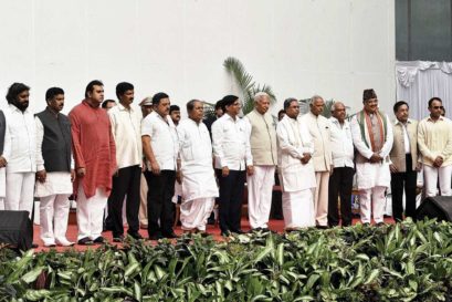 Siddaramaiah (sixth from right) with his new ministers at their swearing-in ceremony in Bengaluru on 19 June