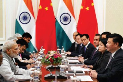 Narendra Modi heads the Indian delegation in talks with China led by its President Xi Jinping  at the SCO Summit in Tashkent on 23 June