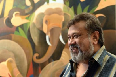 Senaka Senanayake with his painting, Elephants, at Grosvenor Gallery in London