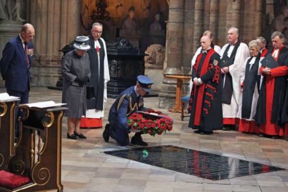 Queen Elizabeth attends a service in Westminster Abbey, London, on the eve of the 100th anniversary of the Battle of the Somme; (facing page) dignitaries from around the world pay their respects to martyrs of the battle at the memorial in Thiepval, France, on 1 July