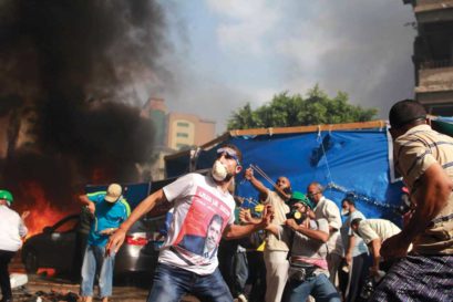 Supporters of Egypt’s ousted President Mohamed Morsi clash with security forces in Cairo, 2013