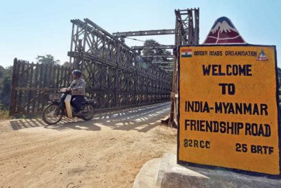 A man rides across the Indo-Myanmar border bridge at Moreh in Manipur