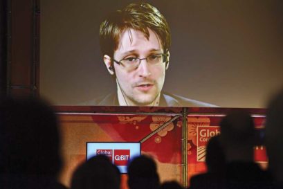 Snowden live on screen from Russia at a trade fair in Germany