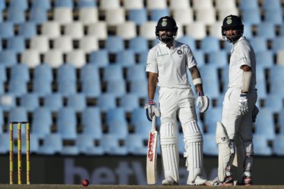 Virat Kohli (left) and Cheteshwar Pujara