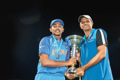 Coach Dravid and captain Prithvi Shaw (left) after the win in Tauranga