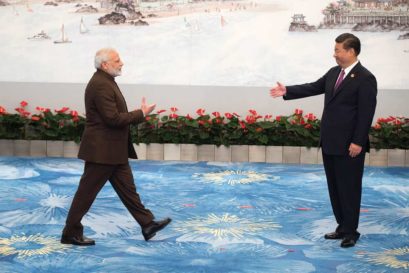 Chinese President Xi Jinping welcomes Prime Minister Narendra Modi at a BRICS banquet in Xiamen on September 4 (Photo: Getty Images)