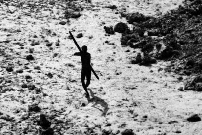 A tribal on North Sentinel Island photographed from an Indian coast guard helicopter after the Tsunami in 2004