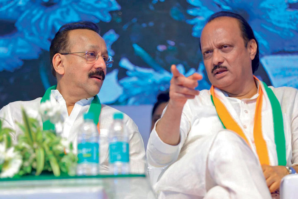 Baba Siddique and Maharashtra Deputy Chief Minister Ajit Pawar