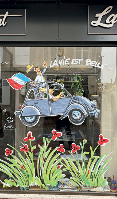 Shop windows painted by Belgian artist Pascal Falisse to celebrate the 80th anniversary of D-Day