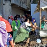 Protesters take down a security bunker outside the residence of a legislator (