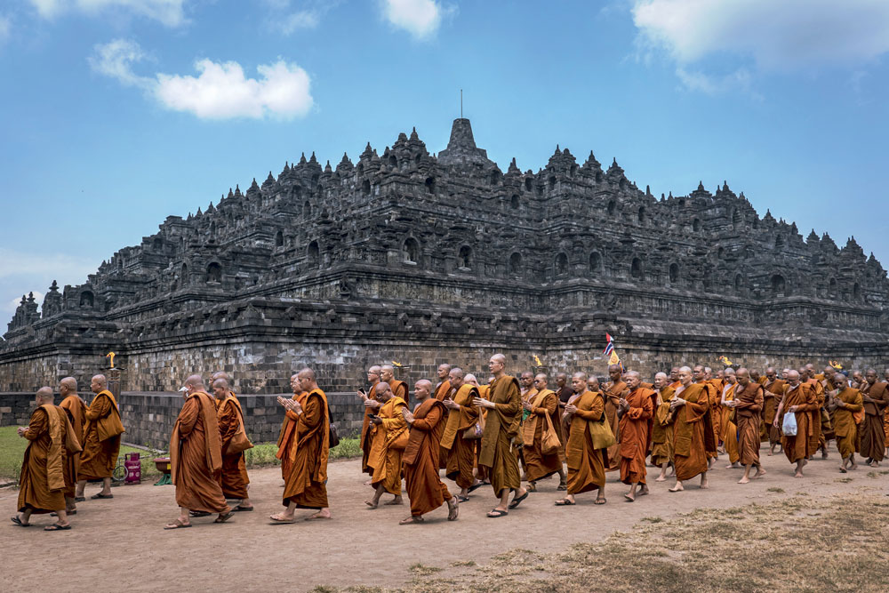 Buddhist monks at the Borobudur temple undertake the Pradaksina, Magelang, Indonesia