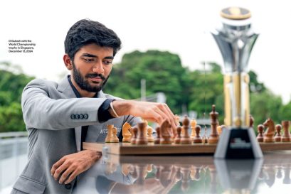 D Gukesh with the World Championship trophy in Singapore, December 13, 2024