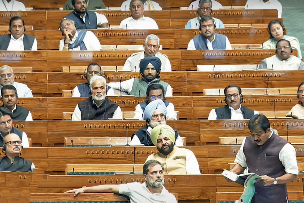 Rahul Gandhi listens as Congress MP KC Venugopal speaks in Lok Sabha, Decemeber 4, 2024