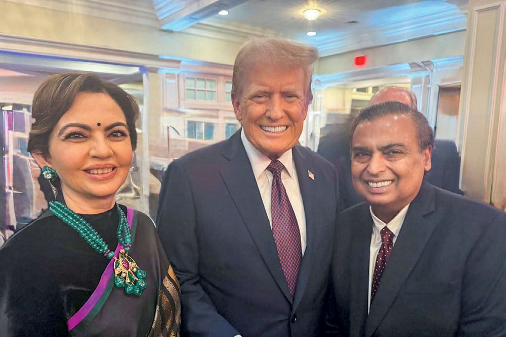 Trump with Nita and Mukesh Ambani at the pre-inauguration dinner