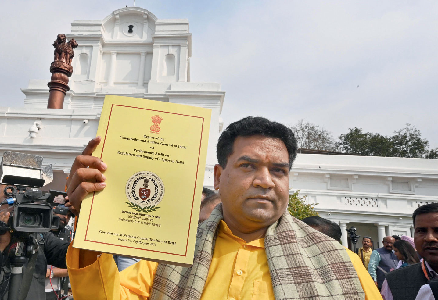 BJP leader and Delhi Minister Kapil Mishra with the CAG report, February 25, 2025