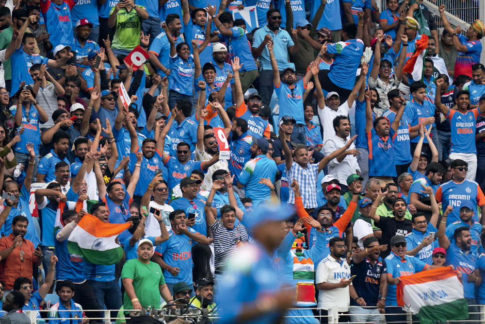 Indian fans in Dubai cheer the team against Pakistan 