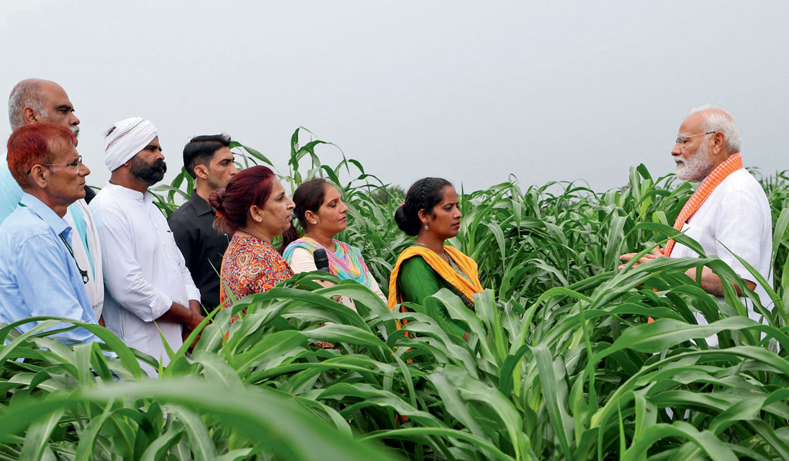 Prime Minister Narendra Modi with farmers at the Indian Agricultural Research Institute, New Delhi, August 11, 2024