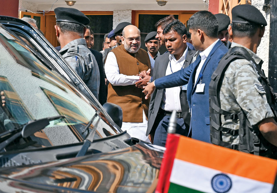 Shah after meeting the family of Arshad Khan, a police officer killed by terrorists, Srinagar, June 27, 2019 
