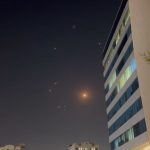 Missiles and air-defense interceptors illuminate the night sky over Doha after Iran launched an attack on US forces at Al Udeid Air Base on June 23, 2025 in Doha