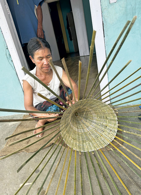 Tirit Langpen and other women of Kenbah-Syntein have been weaving baskets since they were teenagers