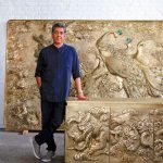 Vikram Goyal with his large-scale brass designs, Delhi