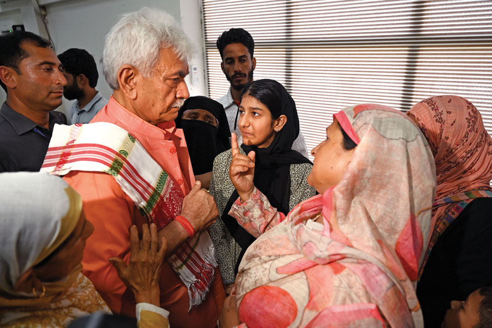 Jammu & Kashmir Lieutenant Governor Manoj Sinha interacts with terror victims at the University of Kashmir’s North Campus in Baramulla on July 13, 2025. In a rare and emotionally charged public meeting, he met victims of terrorism from across Kashmir.