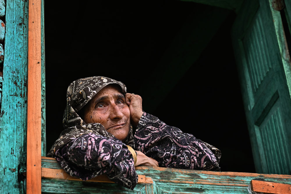 Taja Begum: The mother of three from Fatehgarh, Baramulla, remembers the morning of August 11, 1994. Her son, Nazir Ahmad Sheikh, had gone to a shop to get his trousers interlocked when a young man approached and asked for the same service. Nazir casually asked him what he did for a living. The young man turned to the shopkeeper and said, “There’s a mukhbir (informer) here.” He pulled out an AK-47 and shot Nazir dead. 