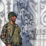 A soldier outside the main administrative building of the Nepal government, Kathmandu, September 11, 2025
